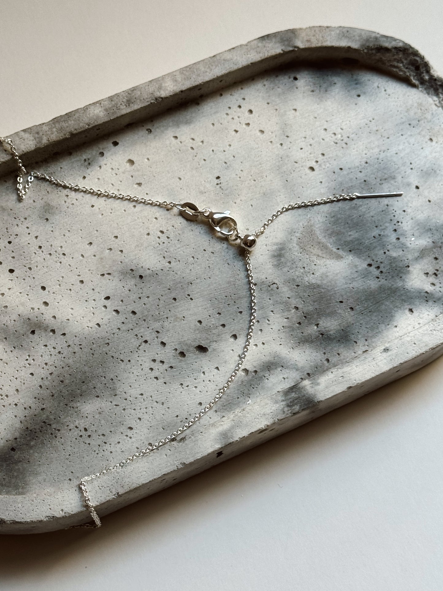 Collar Punto de luz plata